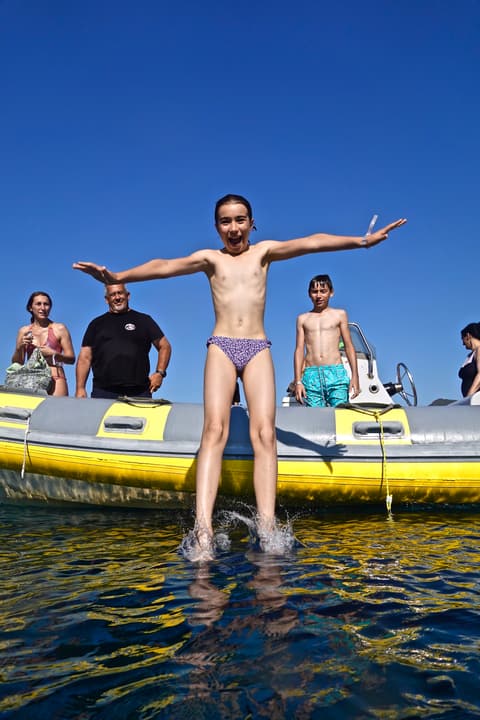 Foto Diving Chia: Salto a braccia aperte. La fine della giornata è sempre la più divertente.